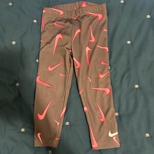 Grey Nike leggings with pink swoosh
